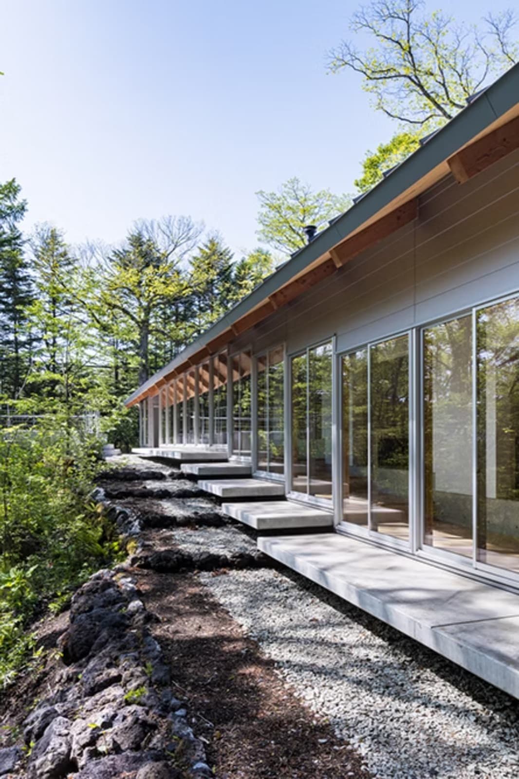 Concrete and timber corridor — Ando architectural language
